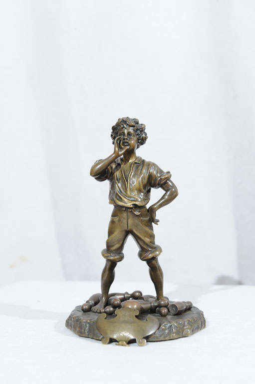 Bronze of a Young Boy with Bowling Pins