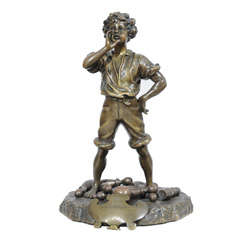 Bronze of a Young Boy with Bowling Pins