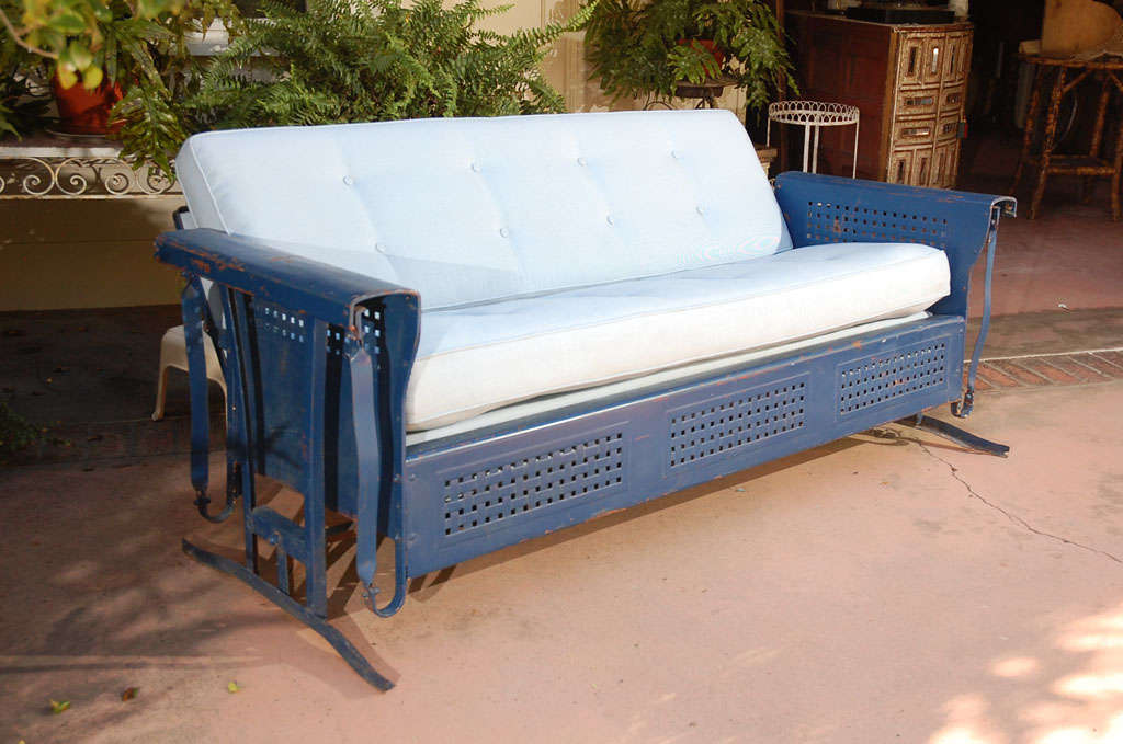 Large, waffle weave Bunting glider with removable cushions. Original paint, new upholstery. Manufactured by the Bunting Glider Company, Philadelphia, PA. Overall length is 75