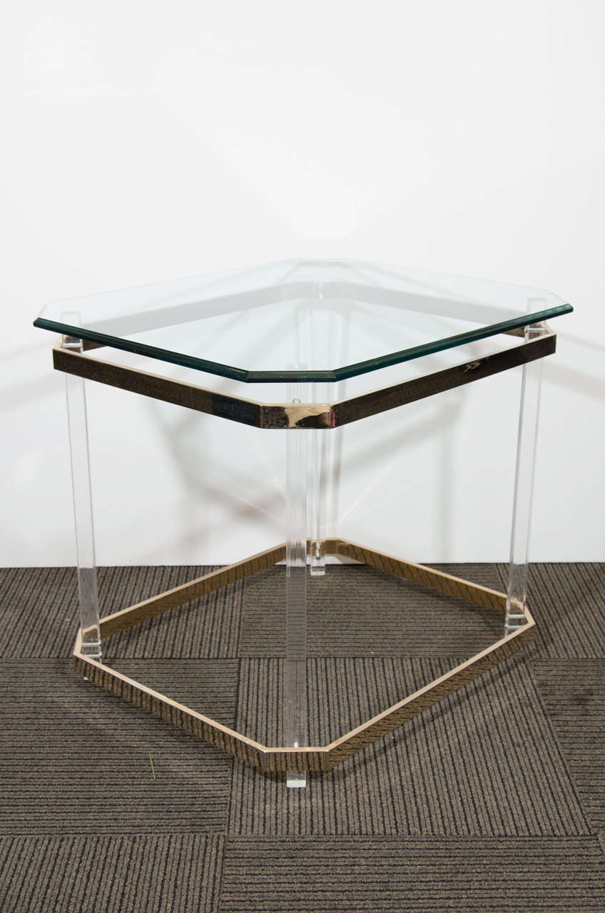 A vintage pair of Charles Hollis Jones end or side tables with Lucite frame, brass banding and glass top.

Good vintage condition with age appropriate wear and patina.