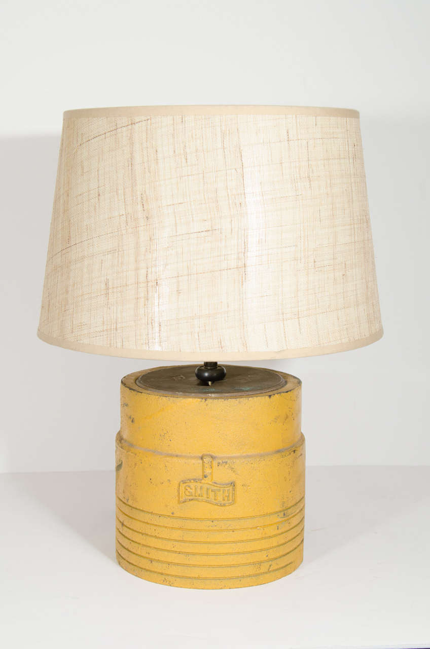 An Industrial pair of table lamps crafted from cast iron oil well drilling sleeves. They marked, 