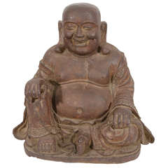 An Antique Chinese Sculpture of Buddha in Cast Iron
