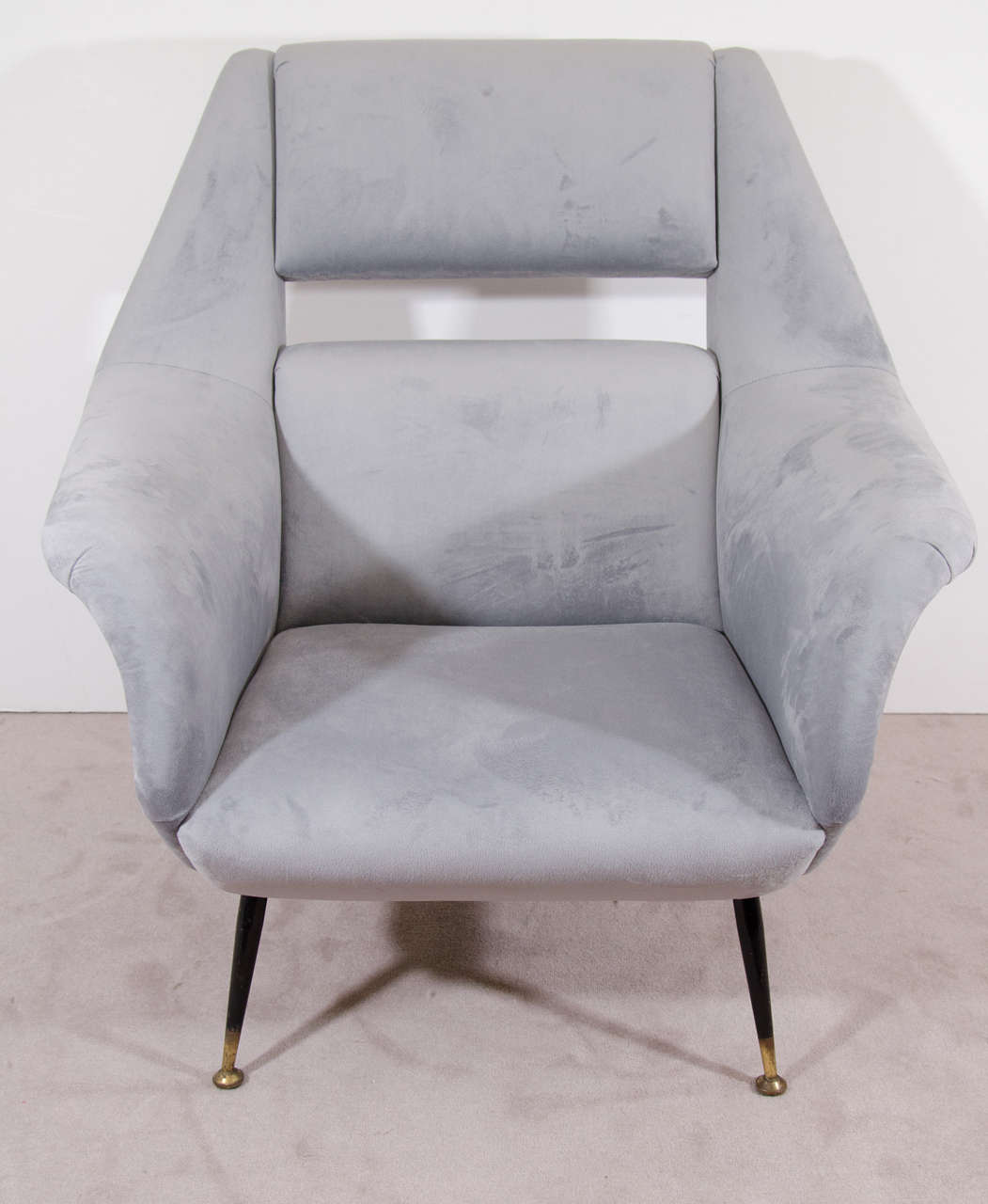 A vintage pair of Italian club chairs with metal legs in the manner of Carlo di Carli. Newly reupholstered in bluish-gray velvet. Good vintage condition with age appropriate wear. Some loss of paint on legs.