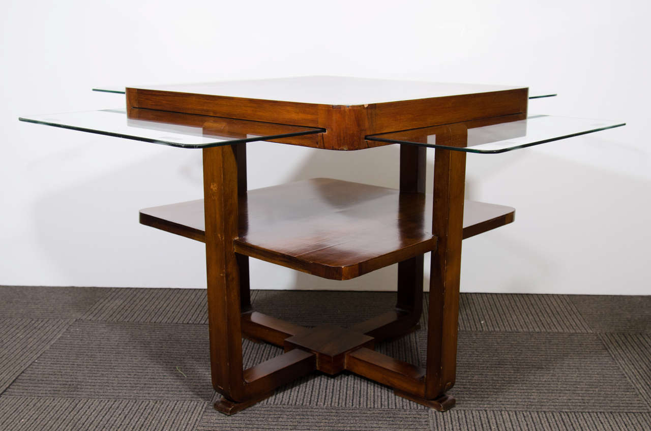 An Great Art Deco French burled mahogany game table with Four expandable glass panels for cocktails.Extremely High End and Well Constructed.Looks incredibly Modern as this is a period French Art Deco Piece.Would Suit Many Styles of Interiors.

  