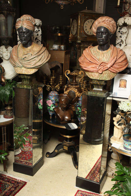 Pair of Plaster Figures of Nubians on Mirrored Pedestals 1