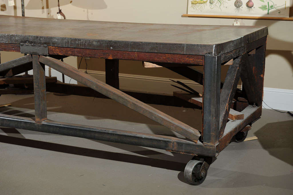 19th Century Industrial Steel Encased Redwood Wheeled Table In Good Condition In San Francisco, CA