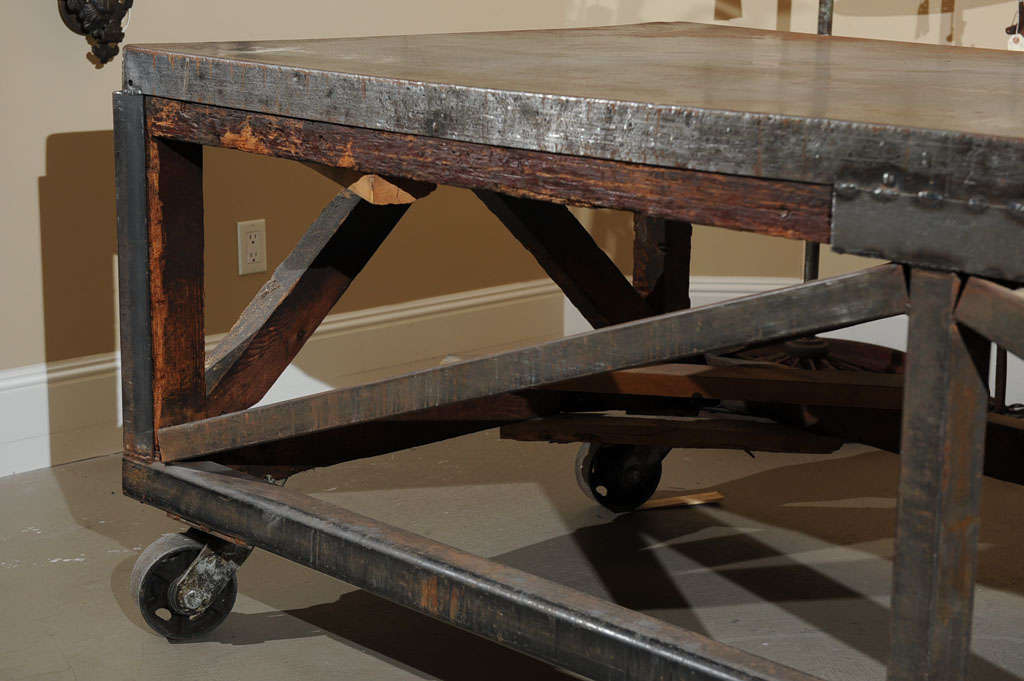 19th Century Industrial Steel Encased Redwood Wheeled Table 2