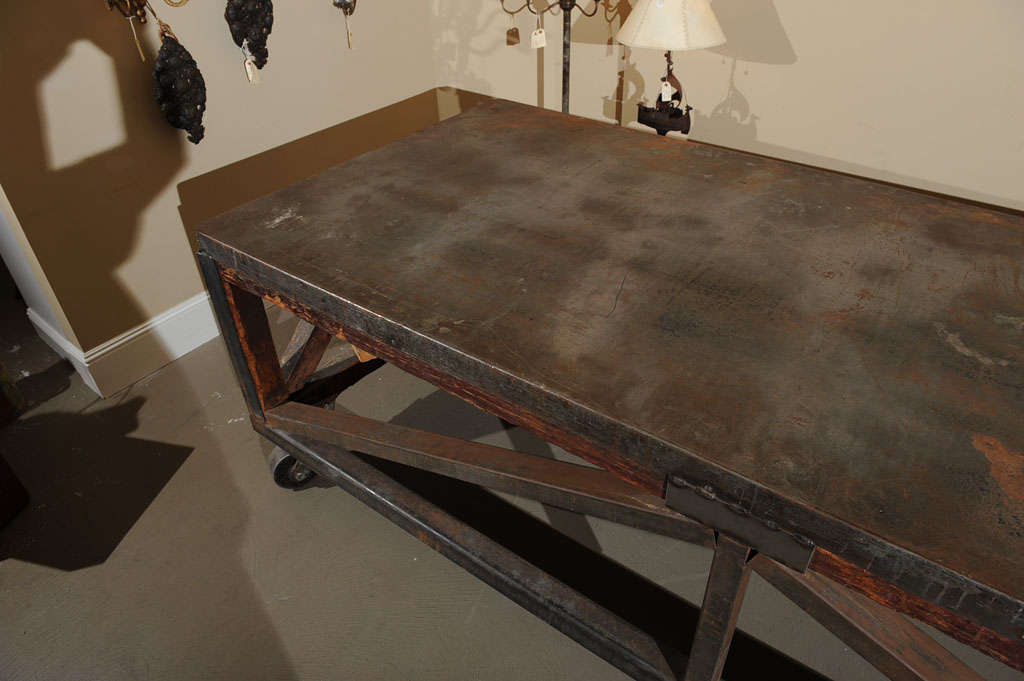 19th Century Industrial Steel Encased Redwood Wheeled Table 4