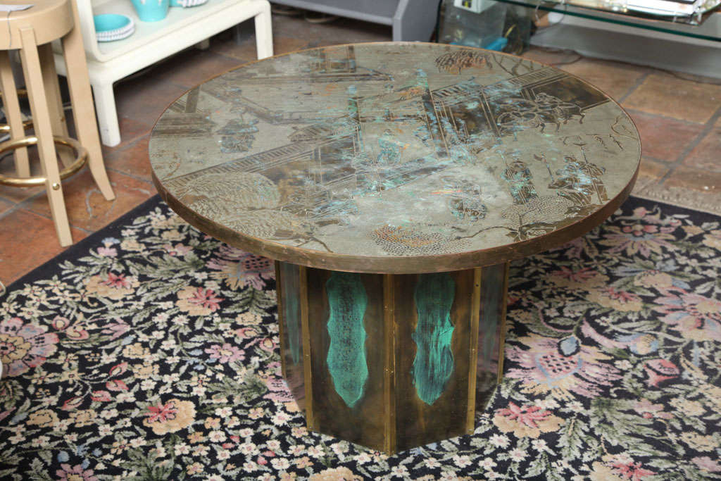 An important signed Phillp and Kelvin Laverne bronze chan table. A patinated bronze and pewter occasional table with Chinoiserie palace motif. A very desirable work and an exceptional height.