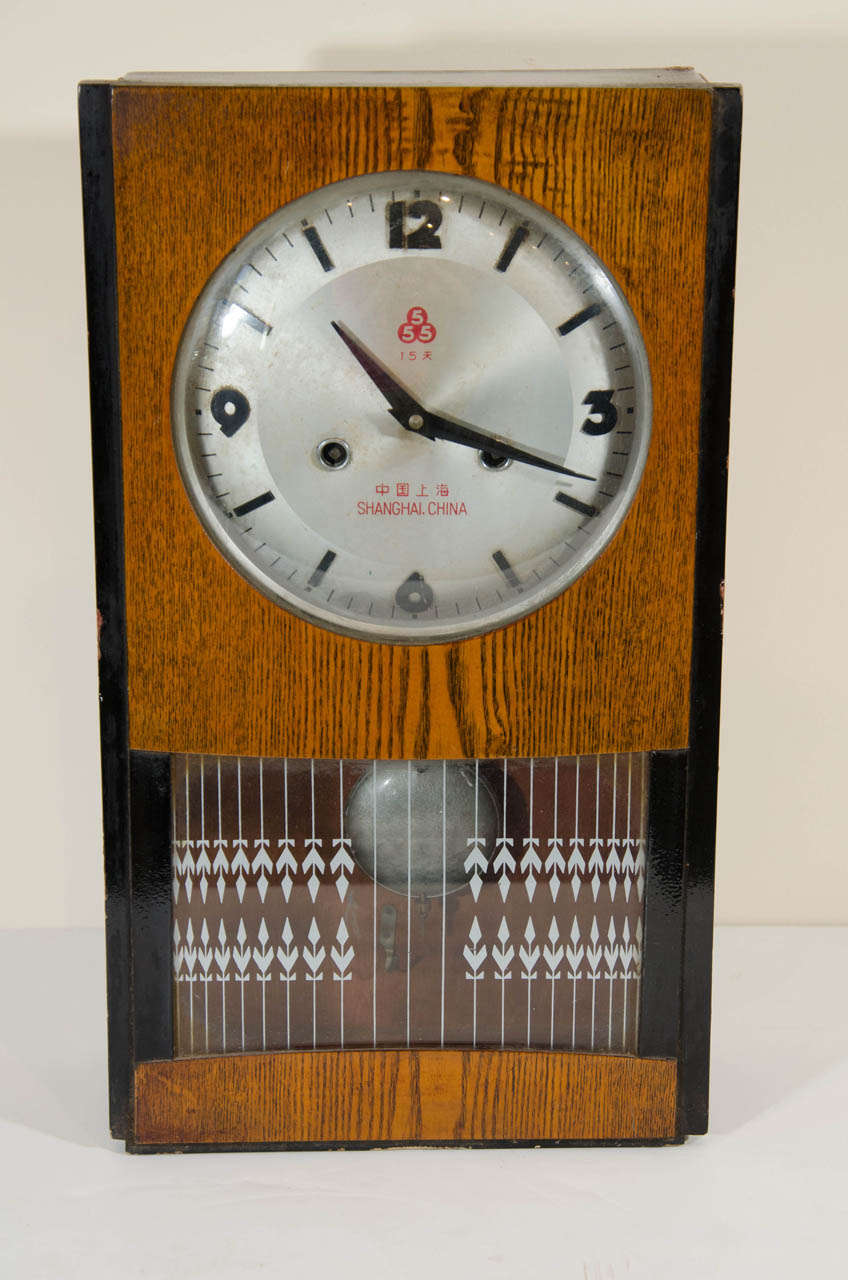 An unusual vintage wind up Chinese pendulum clock from Shanghai, c.1930. In working condition. Runs a little fast. 
M839
