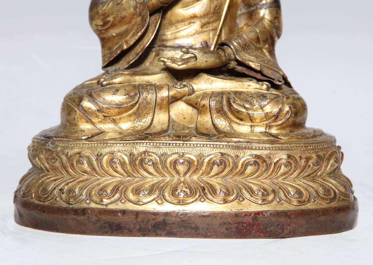 19th Century A 17th- 18th Century Tibetan Gilt Bronze Crowned Seated Buddha