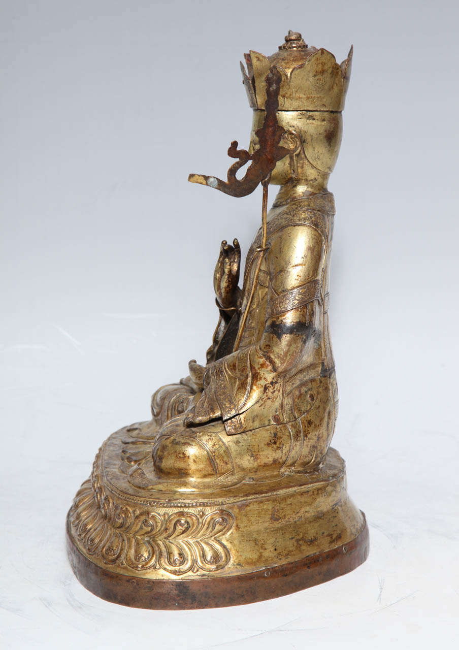 A 17th- 18th Century Tibetan Gilt Bronze Crowned Seated Buddha 3