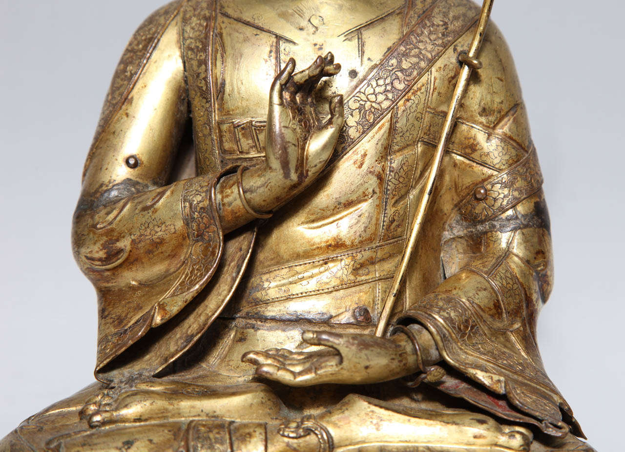 A 17th- 18th Century Tibetan Gilt Bronze Crowned Seated Buddha 4