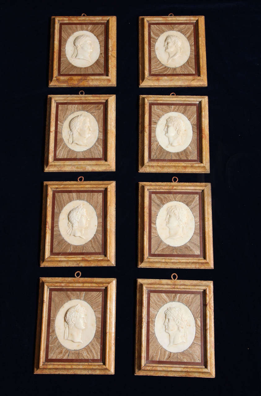 A Set of Eight 19th c. Italian Grand Tour Marble Plaque Reliefs of Emperors. The exquisitely Hand Carved Bas Relief Profiles of Roman Emperors were created from pure white marble. The beige (Sienna) marble surrounds were created using a 