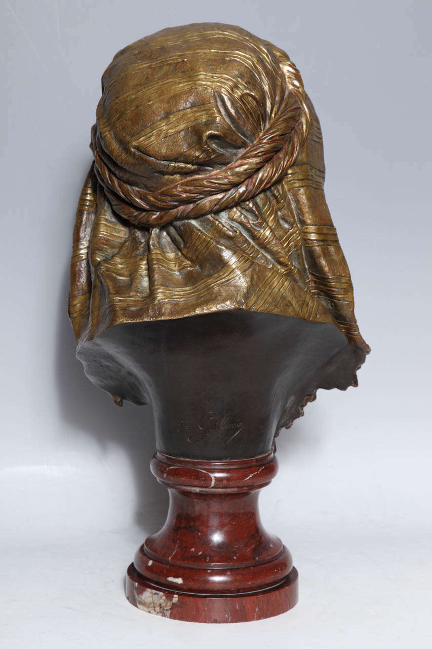 E. Guillemin, (1841-1907) An Antique French Bust of a Nubian in Original Gilt and Patinated Bronze mounted on Rouge Marble Base 3