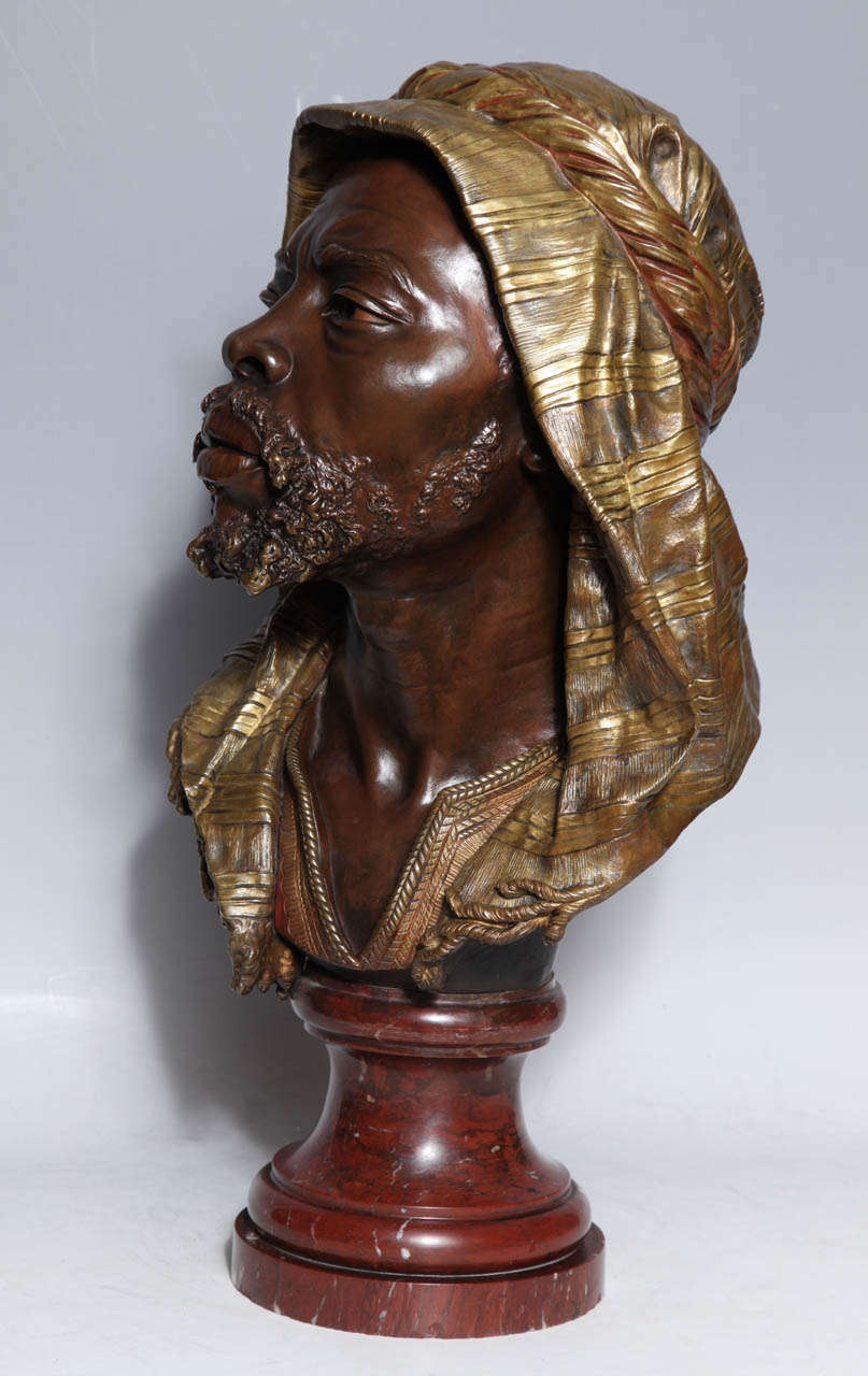 E. Guillemin, (1841-1907) An Antique French Bust of a Nubian in Original Gilt and Patinated Bronze mounted on Rouge Marble Base 6
