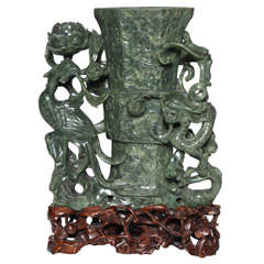 An Intricately Crafted Antique Chinese Spinach Jade Vase with Phoenix Bird and Dragon on a Conforming Stand 3