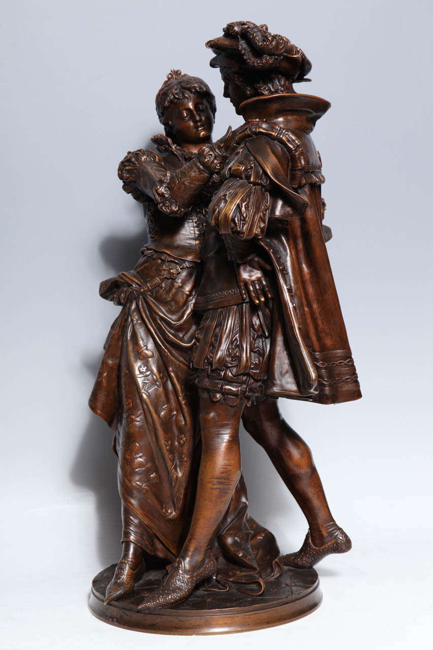 Finely crafted antique French patinated bronze figural group of Romero and Juliet in renaissance attire, each figure is finely cast and then delicately hand chiseled with the finest details by famous French artist Jean-Louis Gregoire (1840-1890).