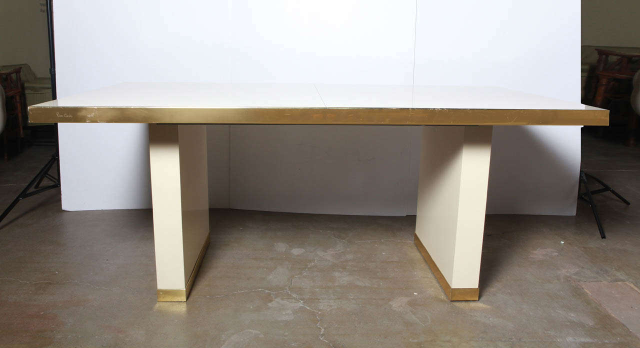 Pierre Cardin ivory and gold dining table for Dillingham. 1970's branded luxury at its best. Comes with two leaves.