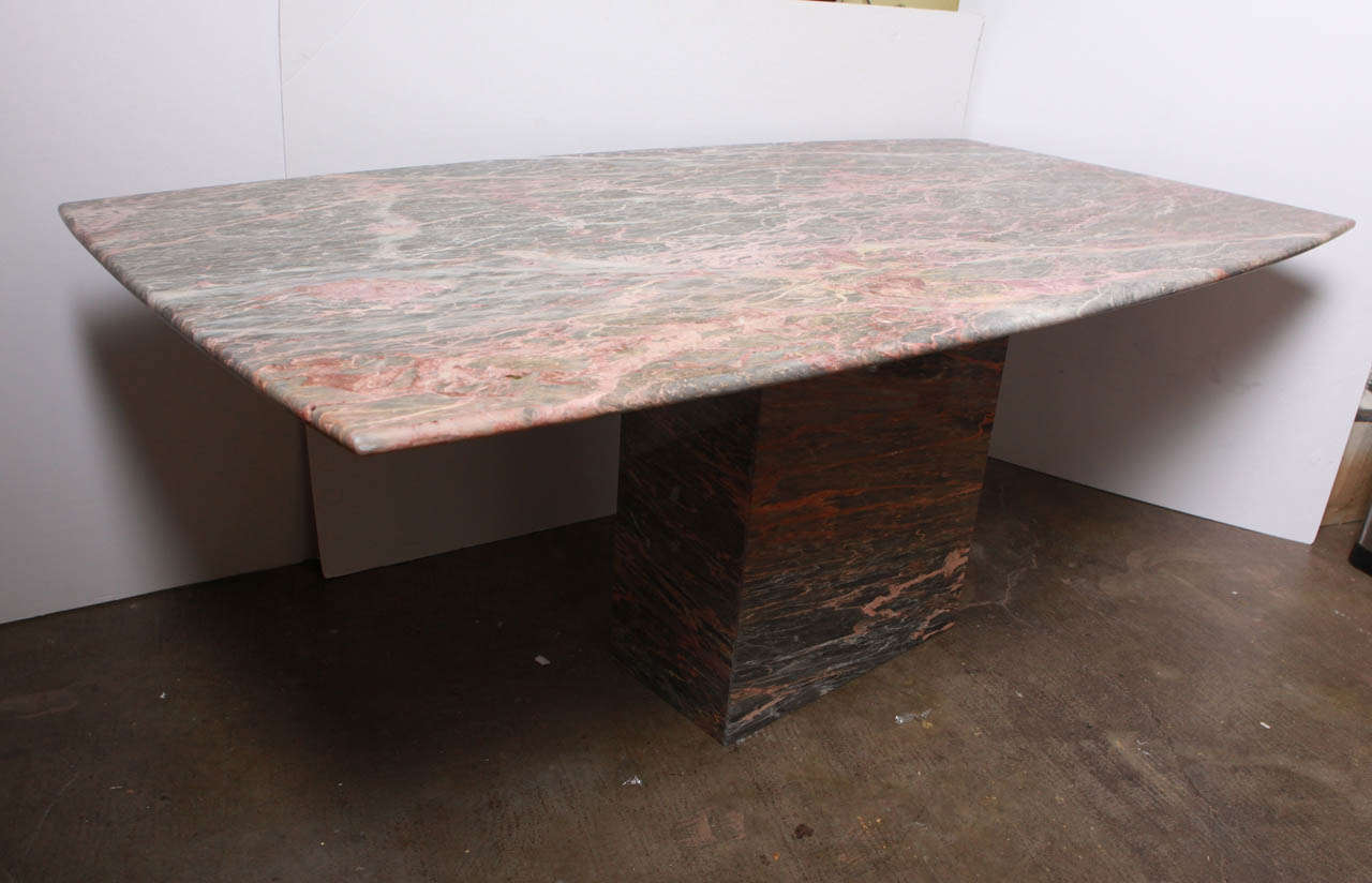 Simple and elegant 1960's Italian marble dining table. Solid marble top over marble plinth. Exquisite condition!