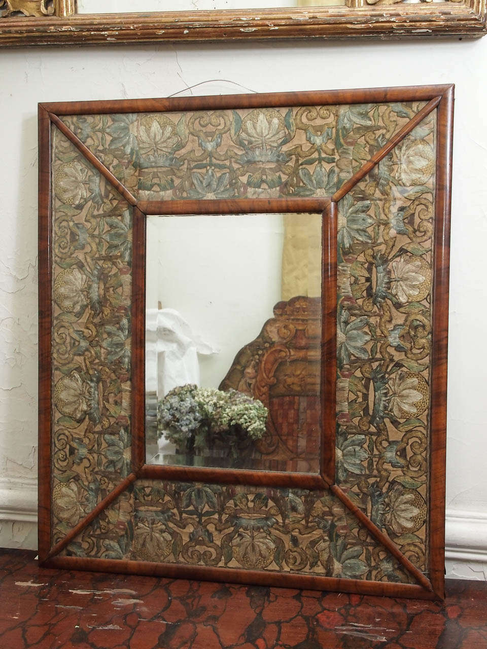English 18th century walnut wood framed stump work mirror.
