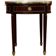 A Louis XVI Mahogany Bouillotte Table