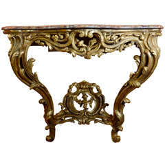 A Louis XV Gilt and Carved Console Table