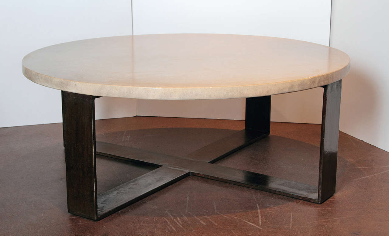 Limestone top with X-base steel coffee table
Transitional style coffee table with distressed limestone top and artisanal, patinated steel X-base. 


Production time 6 to 8 weeks.