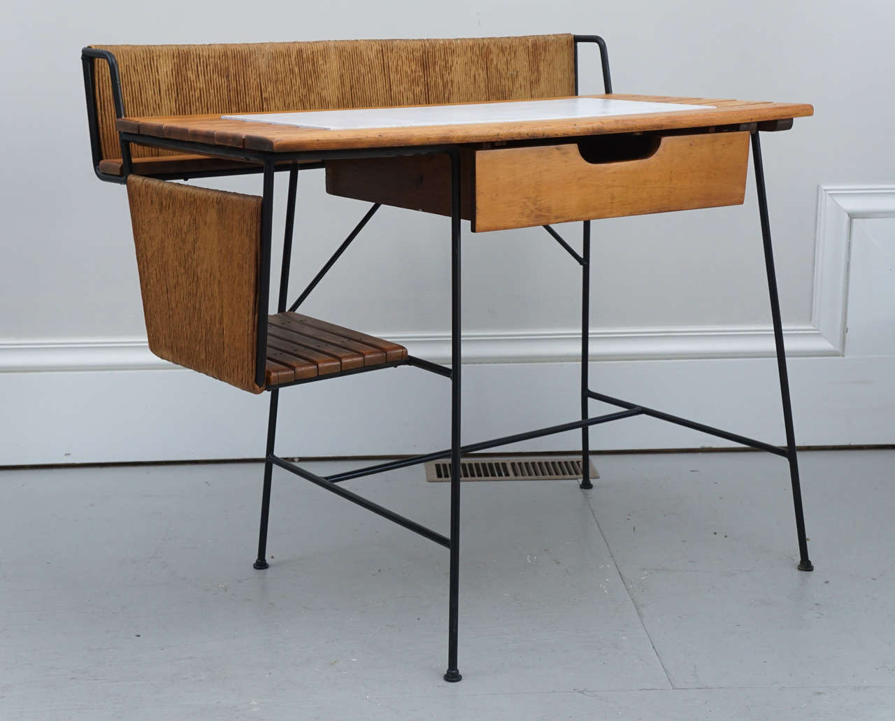 A great desk from the 50's designed by Arthur Umanoff.