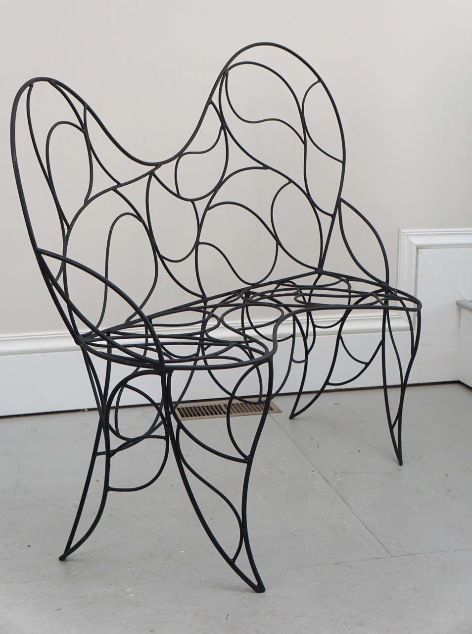 A rather unique artist designed and made iron bench from the 1970s.