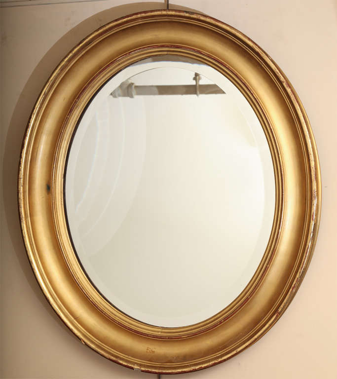 British Pair of 19th Century Oval Gilt Mirrors