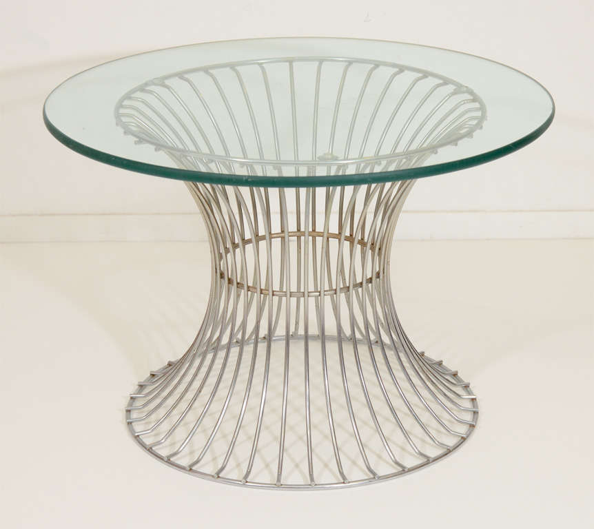 A pair of vintage end tables with round glass tops and trumpeting wire bases in the style of Warren Platner. 

Reduced from $1450.00