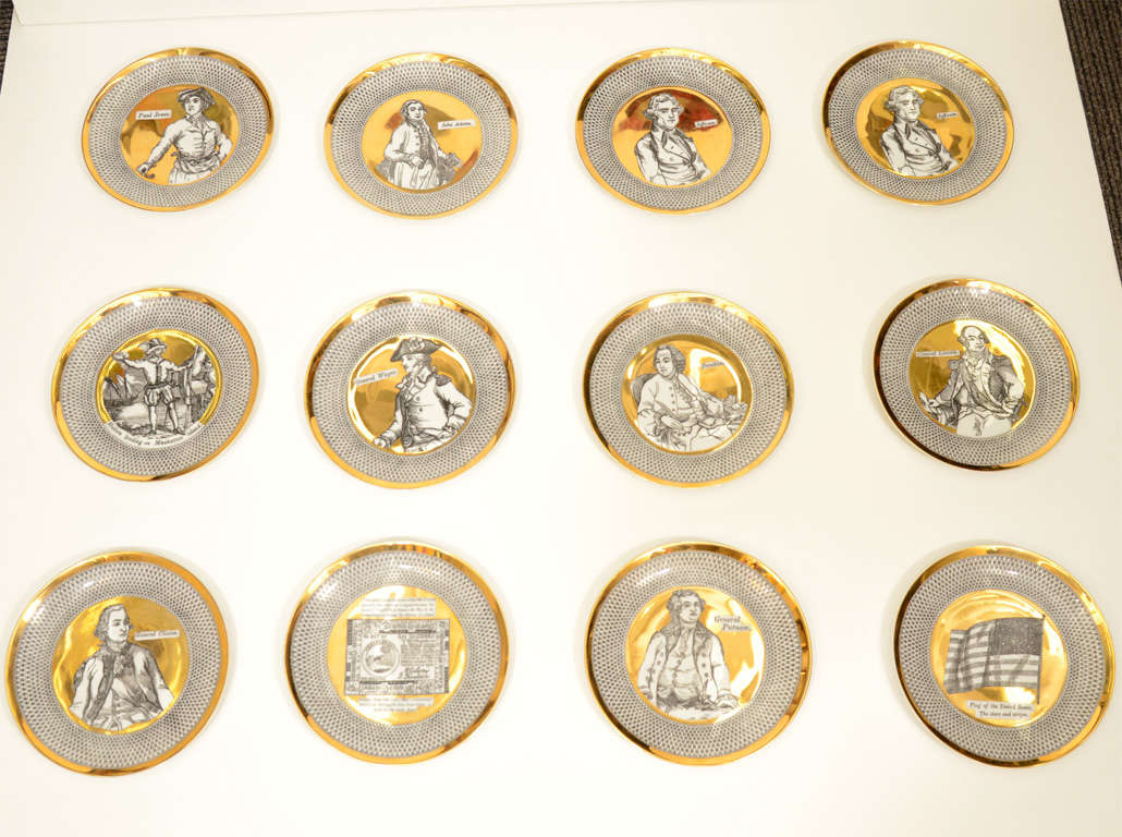 Twelve plates from Piero Fornasetti's line for Tiffany & Co. depicting prominent American historical figures. Each is stamped on the back and retain their original Tiffany & Co. stamped dividers for safe stacking. 

Please note: There are two