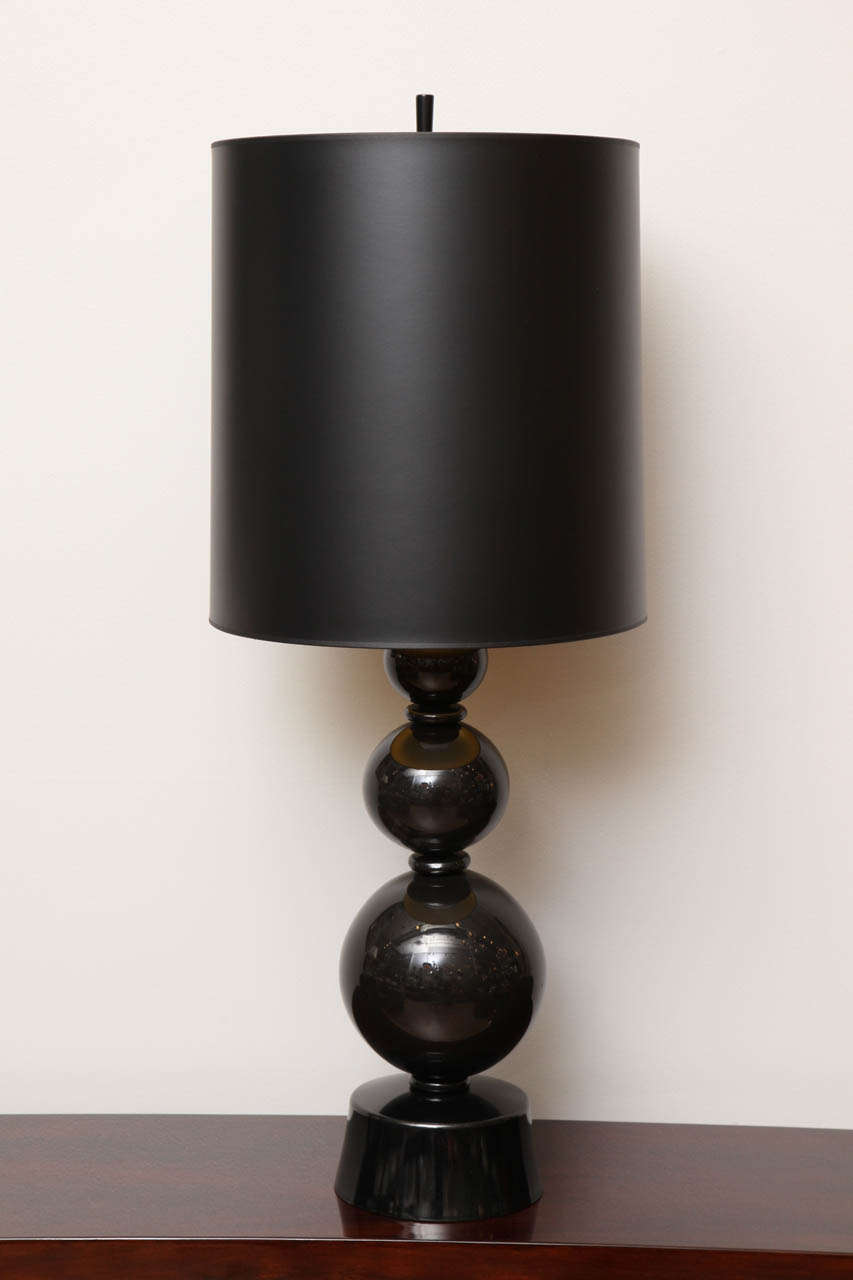 Art Deco table lamps. Stacked Murano black glass spheres with black shades.