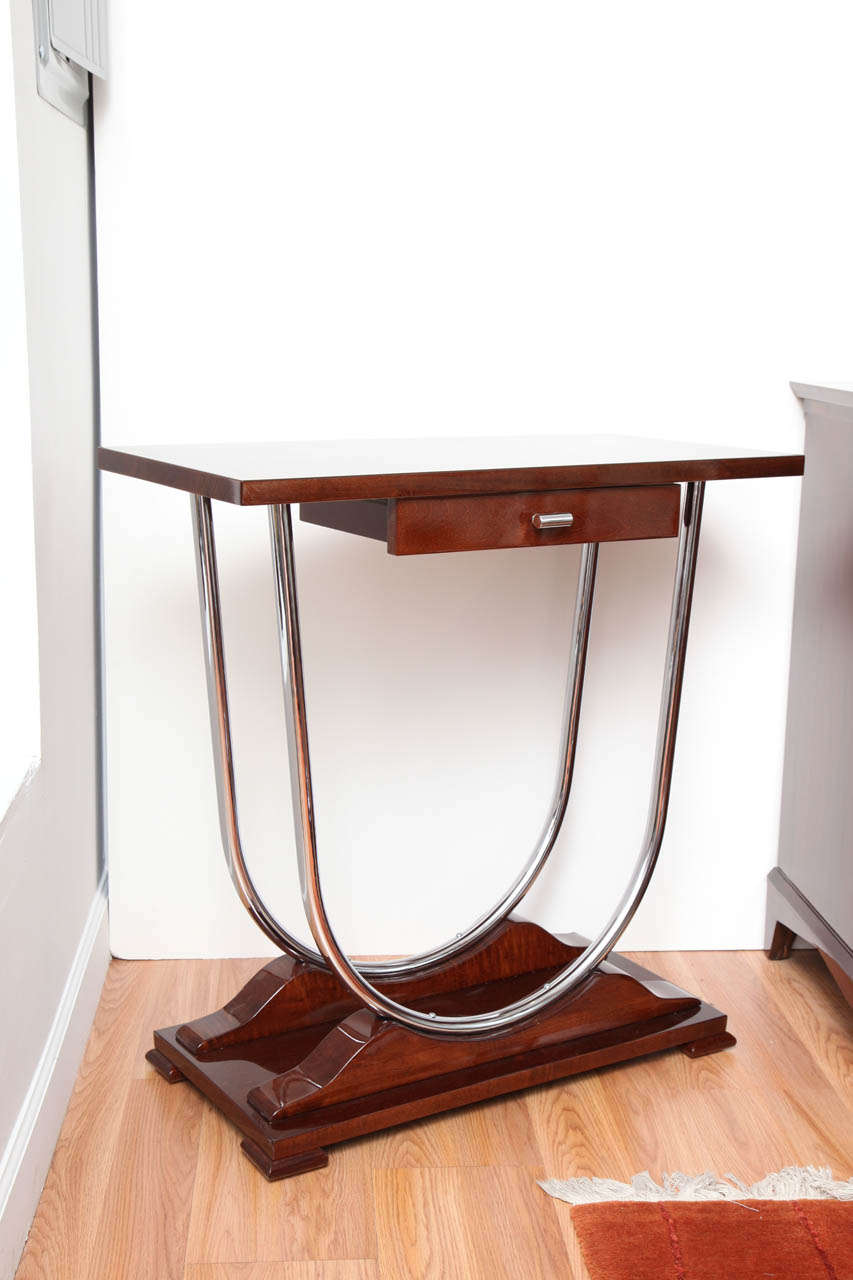 American Pair of Machine Age Art Deco Console Tables with Double Chrome U-Support For Sale