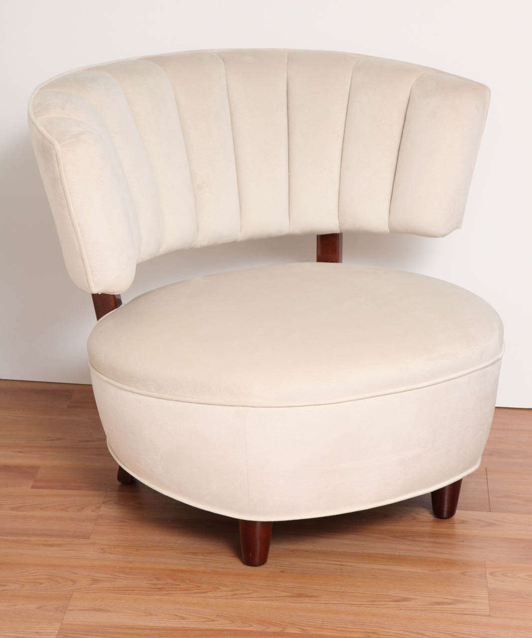 Pair of Art Deco tub chairs designed by Gilbert Rohde in maple and doe skin; Circa 1930's.
