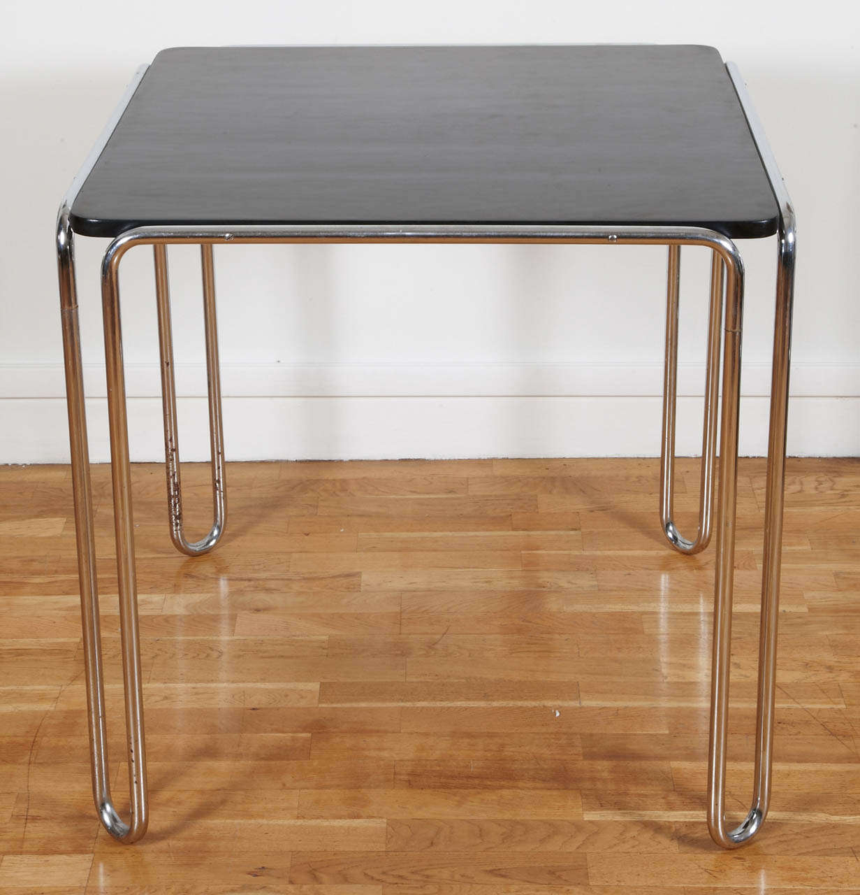 Table Model B10 (1927 design) by Marcel Breuer (1902-1981) in chrome tube steel and a polish black lacquered top. Original chromes, top has been re-lacquered. Czech edition by Antonin Samal (Marcel Breuer editor for Czechoslovakia during the 1930s).