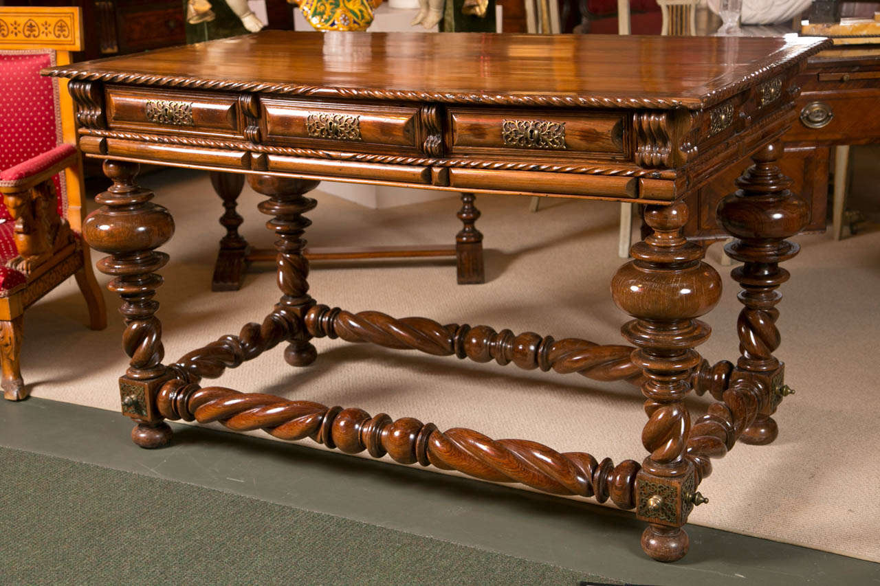 A Late 17th Early 18th Century Portuguese Baroque Brass Mounted Rosewood Library Table