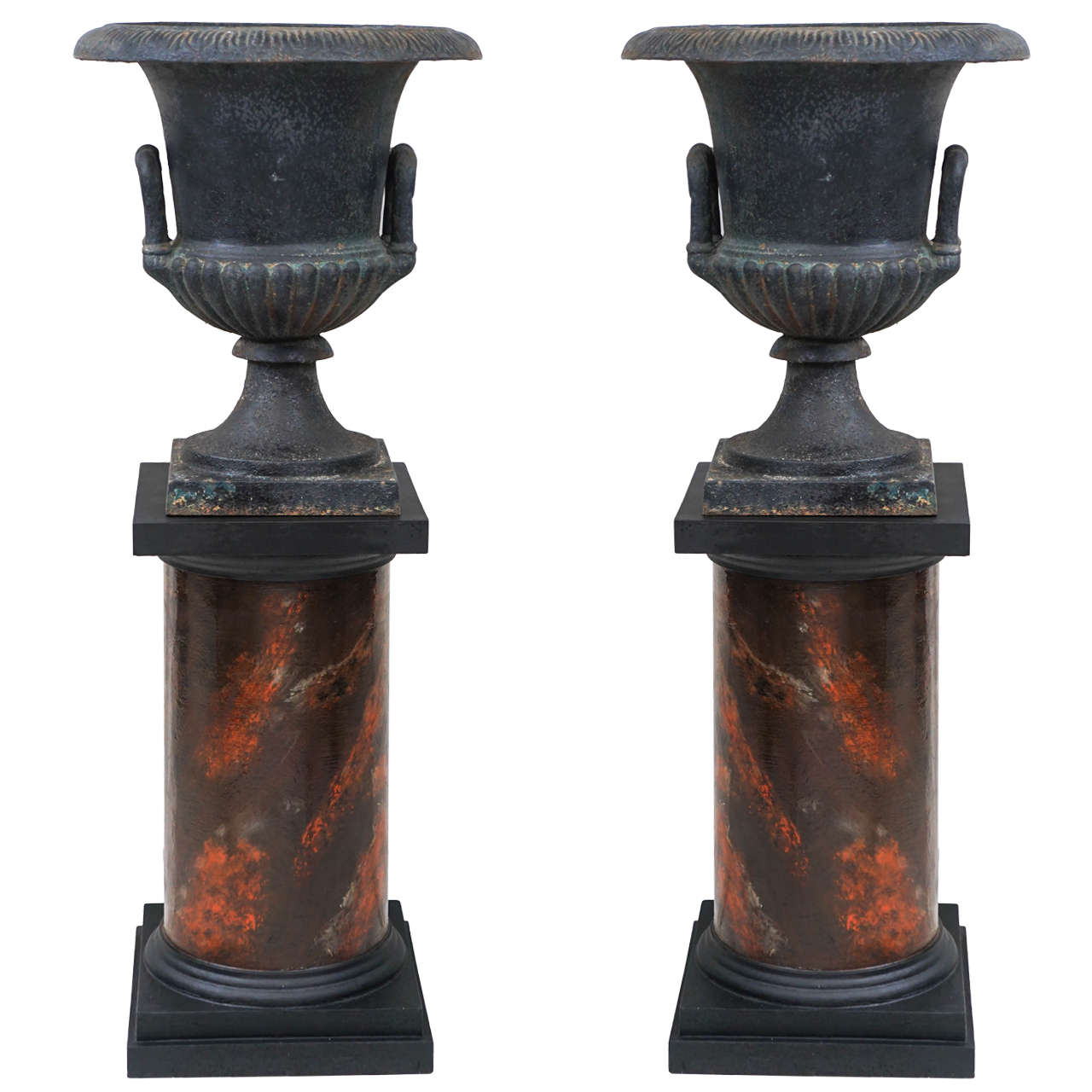 Pair of 19th Century Cast Iron Urns on Marbleized Pedestals