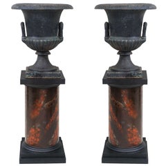 Antique Pair of 19th Century Cast Iron Urns on Marbleized Pedestals
