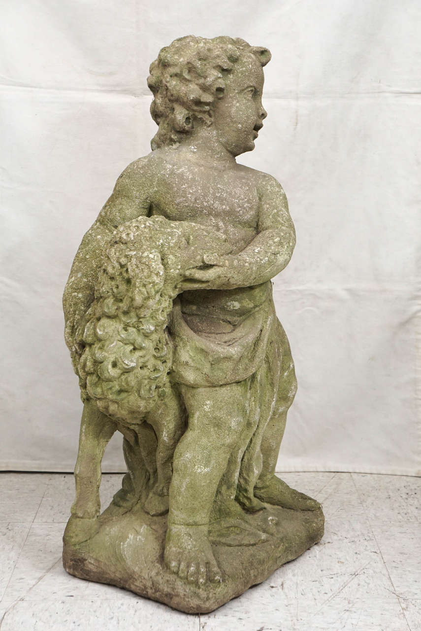 This finely detailed figure made in cast stone with hand finishing was made around 1900 to 1920. Cast stone such as Haddenstone was produced in England and France during the early 19th century into the 20th and up until today. Made with crushed