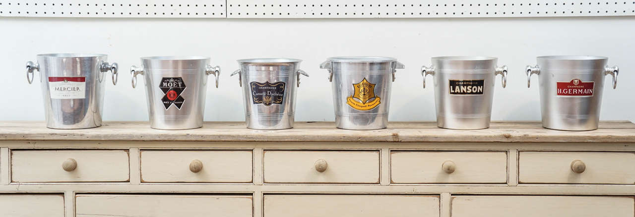 This collection of Champagne buckets dates from 1960 and are in metal. Each has its own labels, identifying the name of the French champagne. These would make wonderful ice buckets or wine holders. Very reasonably priced and very colorful!