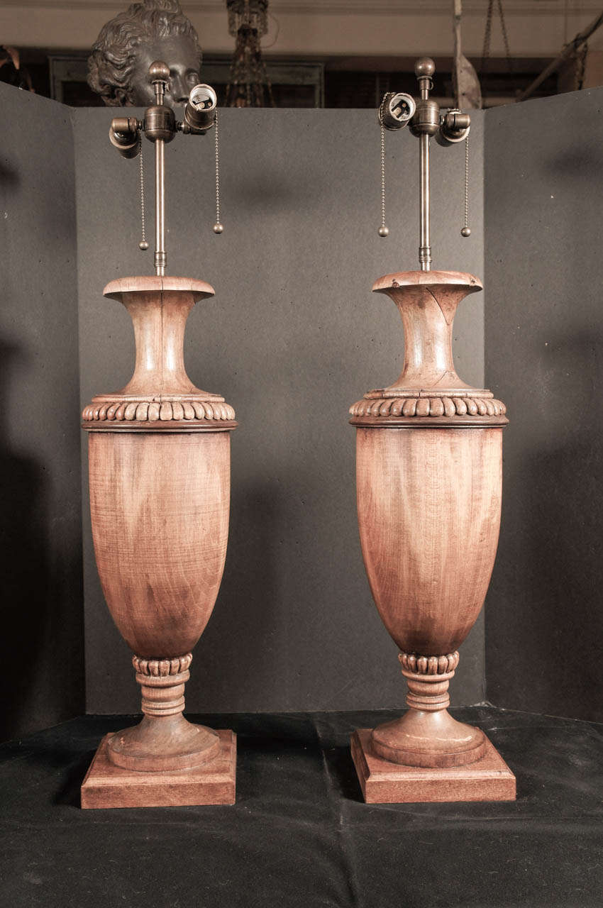 A Pair of Carved Pine Urn Form Lamps From Jack Warner's Estate