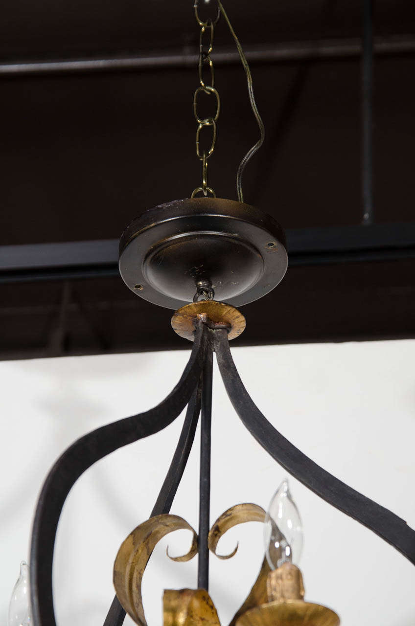 Elegant Fleur de Lis Chandelier with Stylized Latern Form in Wrought Iron In Excellent Condition In Fort Lauderdale, FL