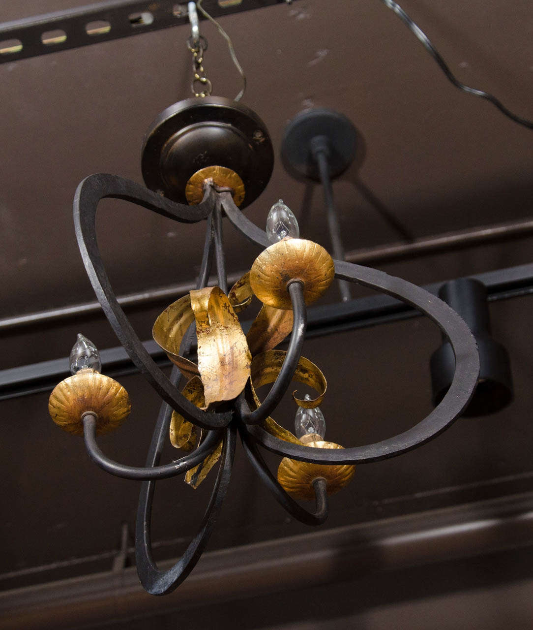 20th Century Elegant Fleur de Lis Chandelier with Stylized Latern Form in Wrought Iron
