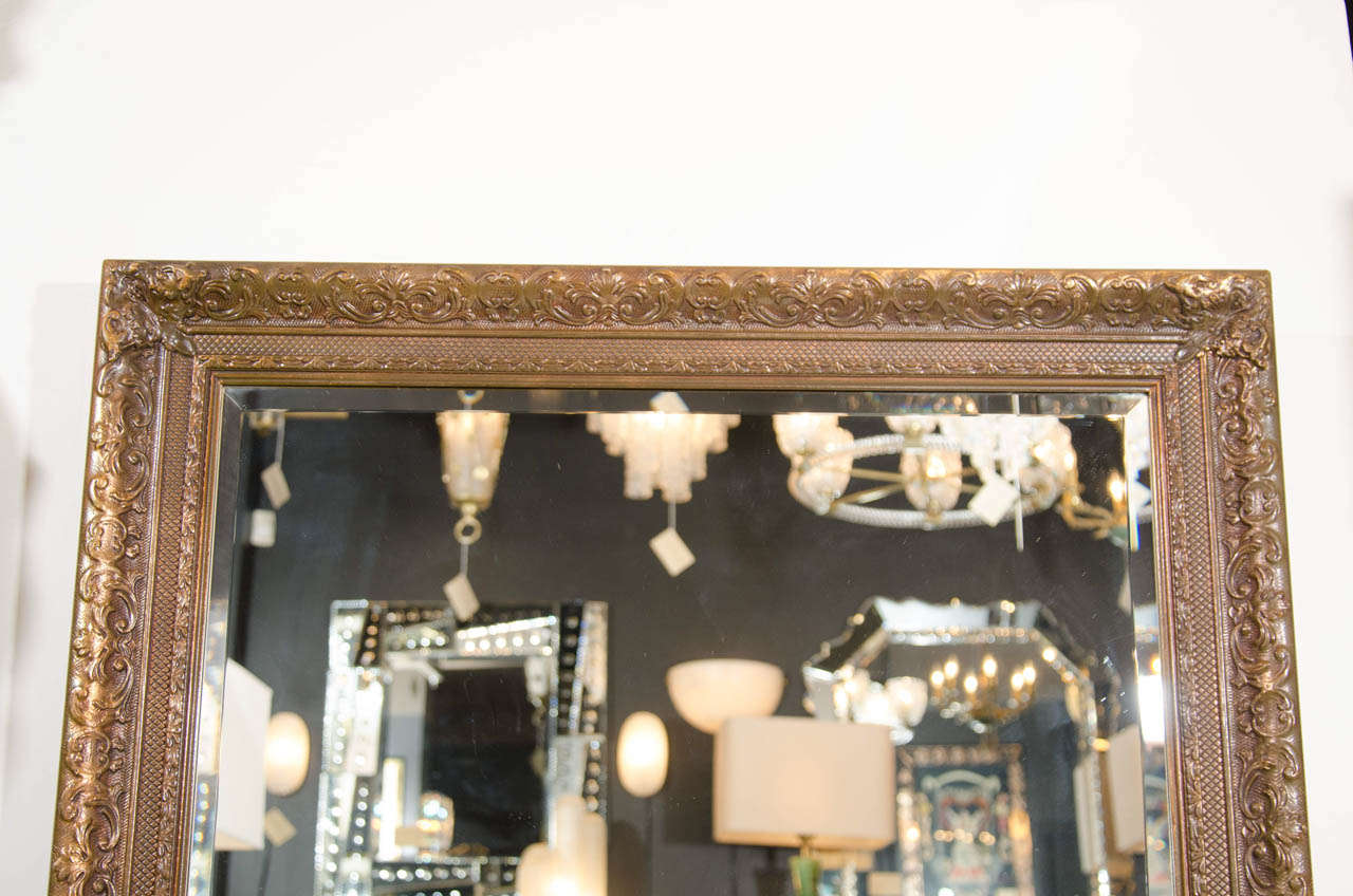 Elegant Large Italian Antiqued Gilt Wood Mirror with Hand Carved Frame