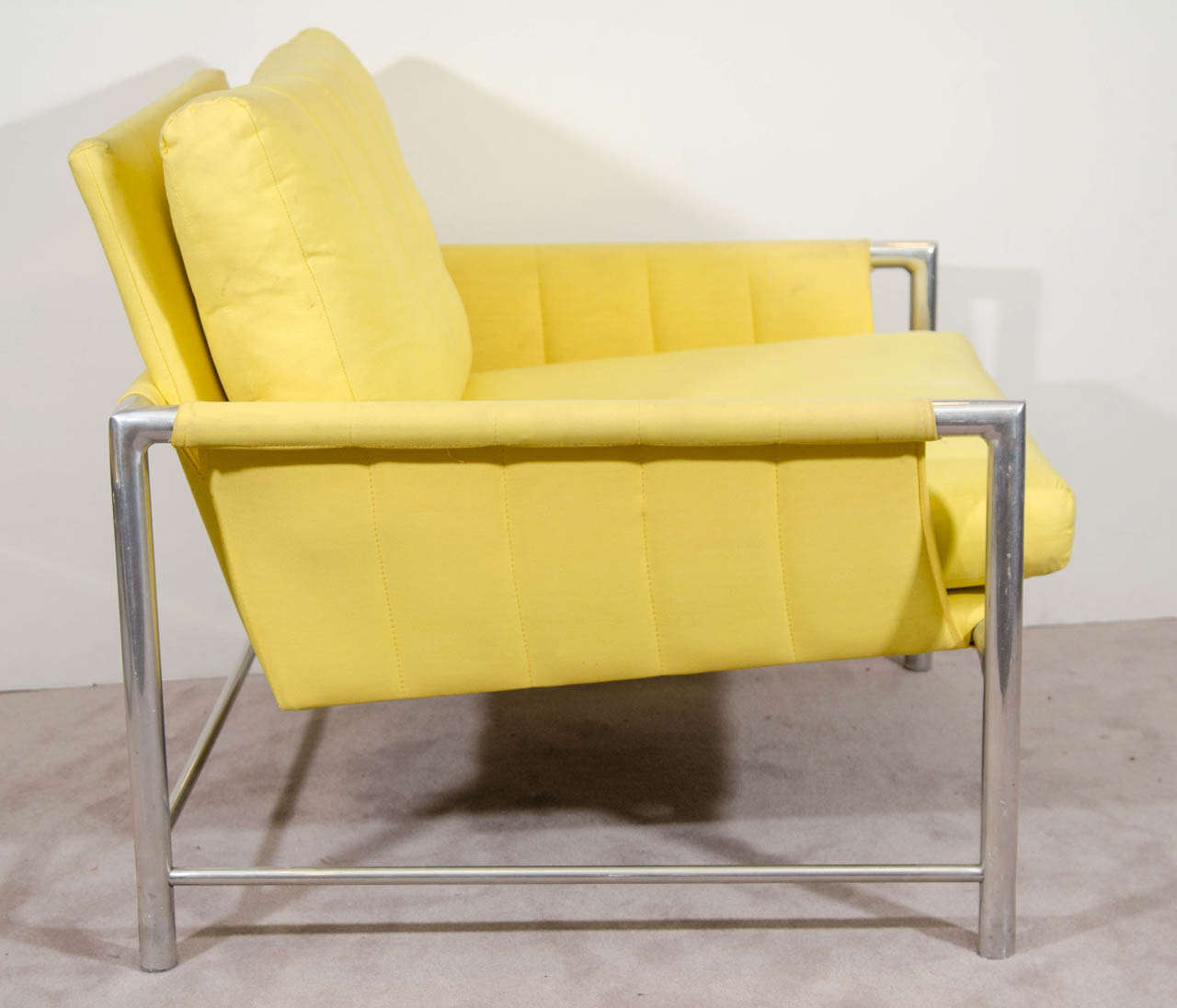 A Mid Century Milo Baughman Style Armchair in Lemon Yellow Fabric In Good Condition In New York, NY