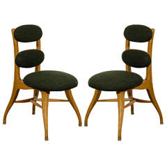 A Mid Century Set of Four Wooden Sculptural Dining Chairs by Poul Volther