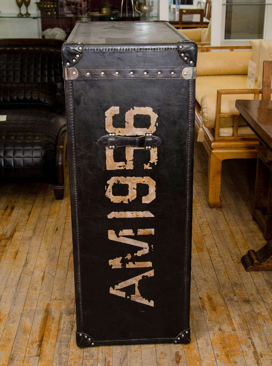 Leather A Vintage Checkered Trunk Form Chest by Andrew Martin