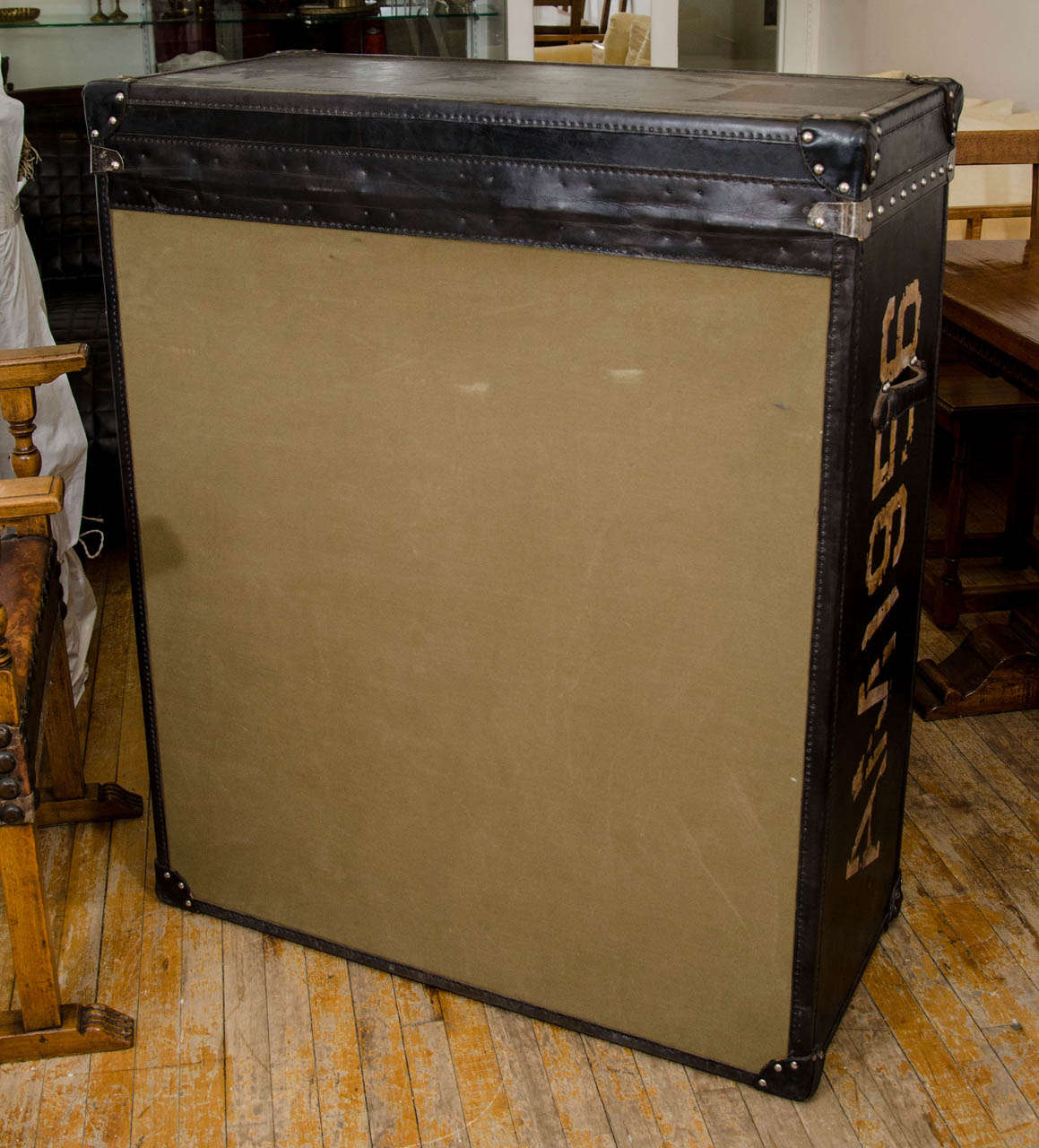 A Vintage Checkered Trunk Form Chest by Andrew Martin 1